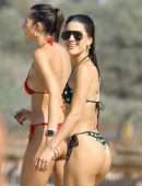 Camila Coelho Booty in a Black and Green Bikini at the Beach