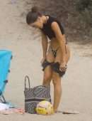 Camila Coelho Booty in a Black and Green Bikini at the Beach