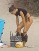 Camila Coelho Booty in a Black and Green Bikini at the Beach