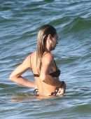 Candice Swanepoel Booty in Tiny Thong Bikini on the Beach in Miami