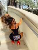 Claudia Romani Posing for Soro Bags and Accessories