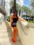 Claudia Romani Posing for Soro Bags and Accessories