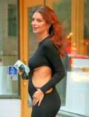 Emily Ratajkowski Arrives at Her Apartment Holding Her Baby Bump