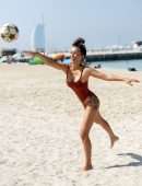 Laura Anderson in Swimsuit, Display her Ball Skills on the Beach in Dubai
