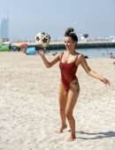 Laura Anderson in Swimsuit, Display her Ball Skills on the Beach in Dubai