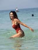 Laura Anderson in Swimsuit, Display her Ball Skills on the Beach in Dubai