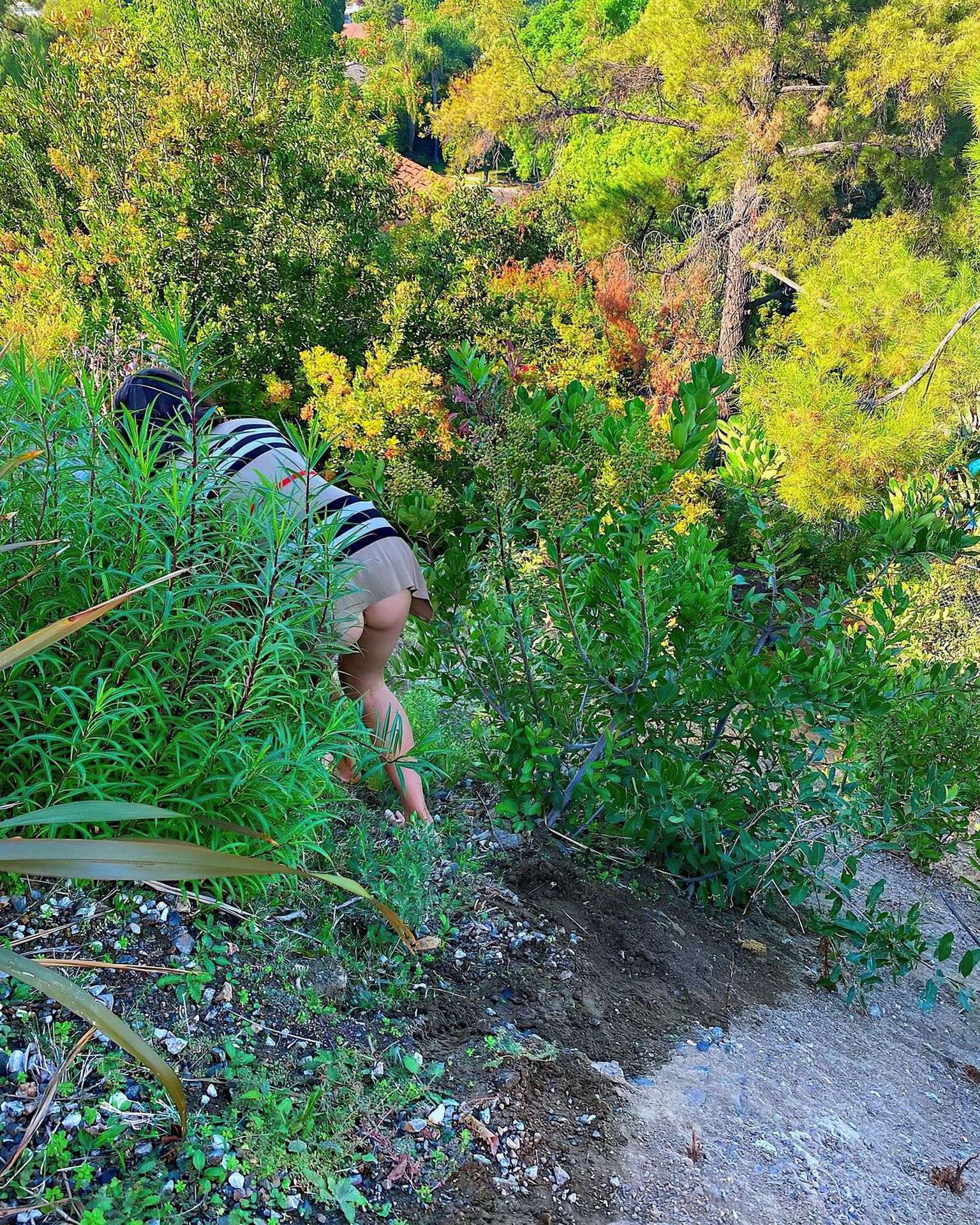 Olivia Culpo Booty Catches her Dog in Bushes