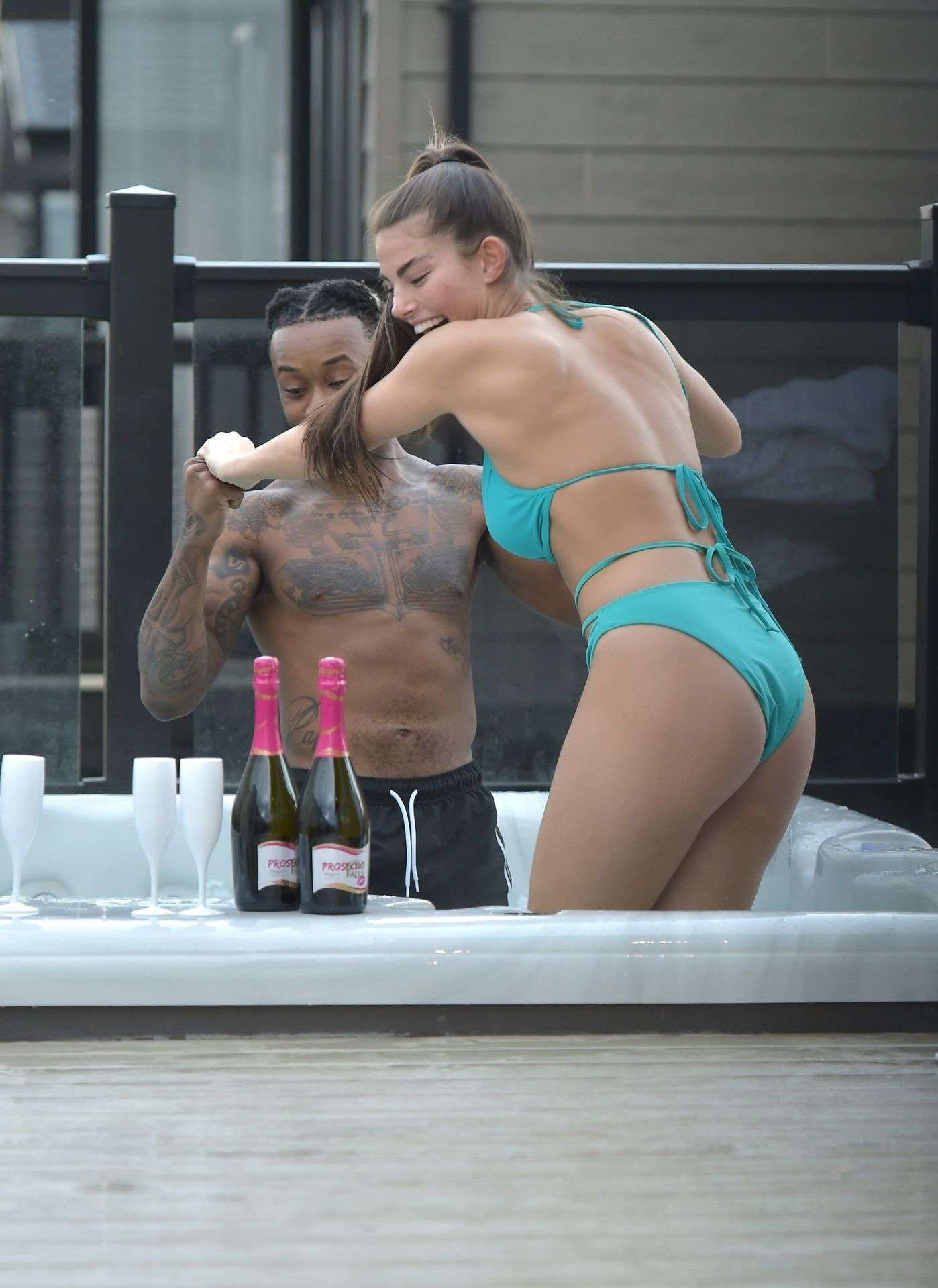 Rebecca Gormley in Bikini Enjoys Hot Tub Cabin with Biggs
