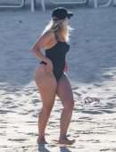 Bebe Rexha Booty in a Black Swimsuit on a Beach Surfing in Cabo San Lucas