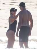 Bebe Rexha Booty in a Black Swimsuit on a Beach Surfing in Cabo San Lucas