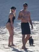 Bebe Rexha Booty in a Black Swimsuit on a Beach Surfing in Cabo San Lucas