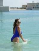 Chloe Goodman in Blue Swimsuit at Beach in Dubai