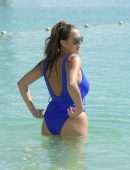 Chloe Goodman in Blue Swimsuit at Beach in Dubai