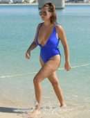 Chloe Goodman in Blue Swimsuit at Beach in Dubai
