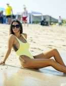 Laura Anderson in a Yellow Swimsuit Enjoys a Day at the Beach in Dubai