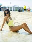 Laura Anderson in a Yellow Swimsuit Enjoys a Day at the Beach in Dubai