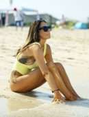 Laura Anderson in a Yellow Swimsuit Enjoys a Day at the Beach in Dubai