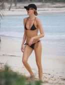 Martha Hunt in Bikini, Walking on the Beach with her Fiancé in Tulum, Mexico