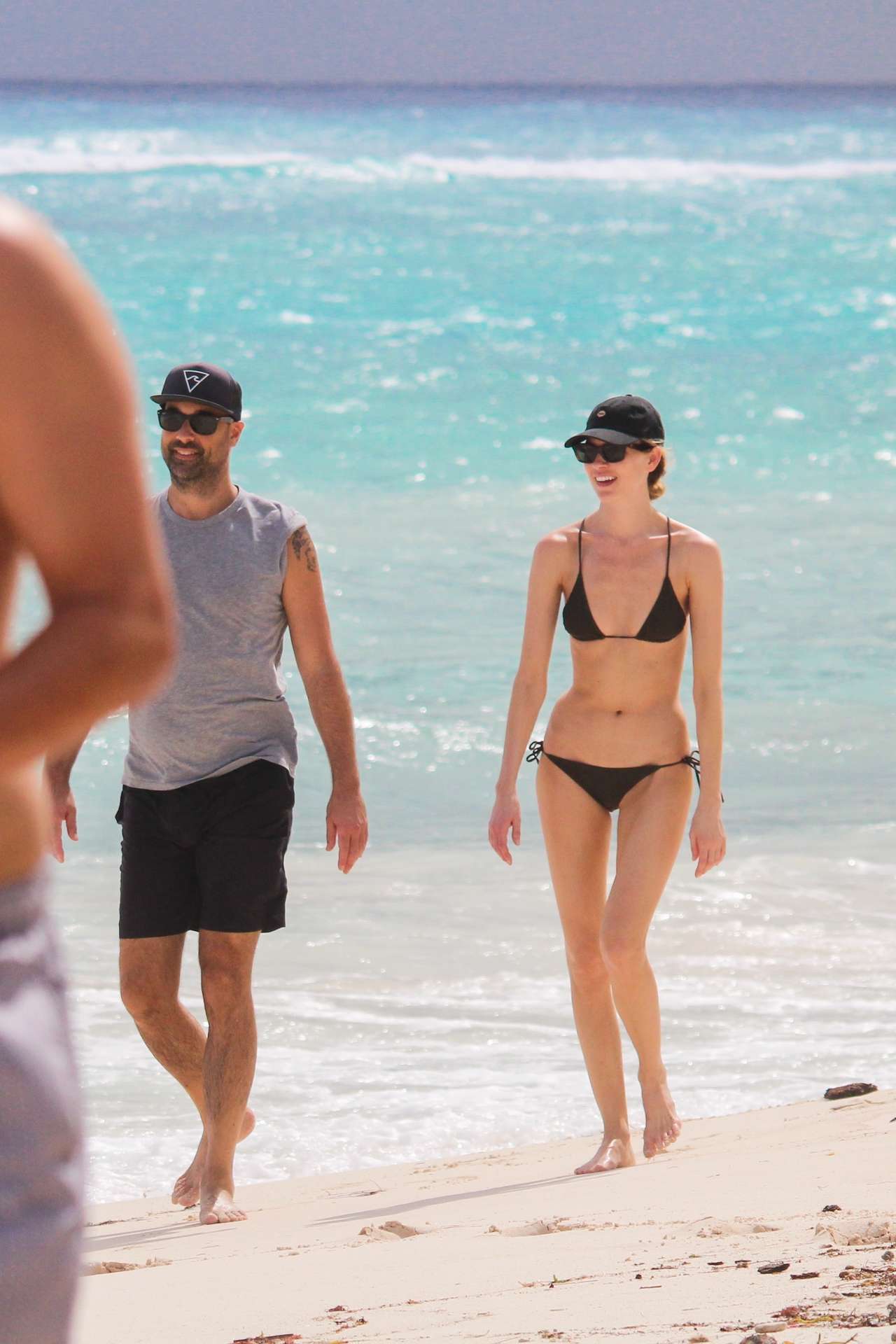 Martha Hunt in Bikini, Walking on the Beach with her Fiancé in Tulum, Mexico