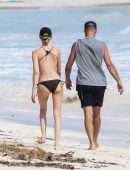 Martha Hunt in Bikini, Walking on the Beach with her Fiancé in Tulum, Mexico
