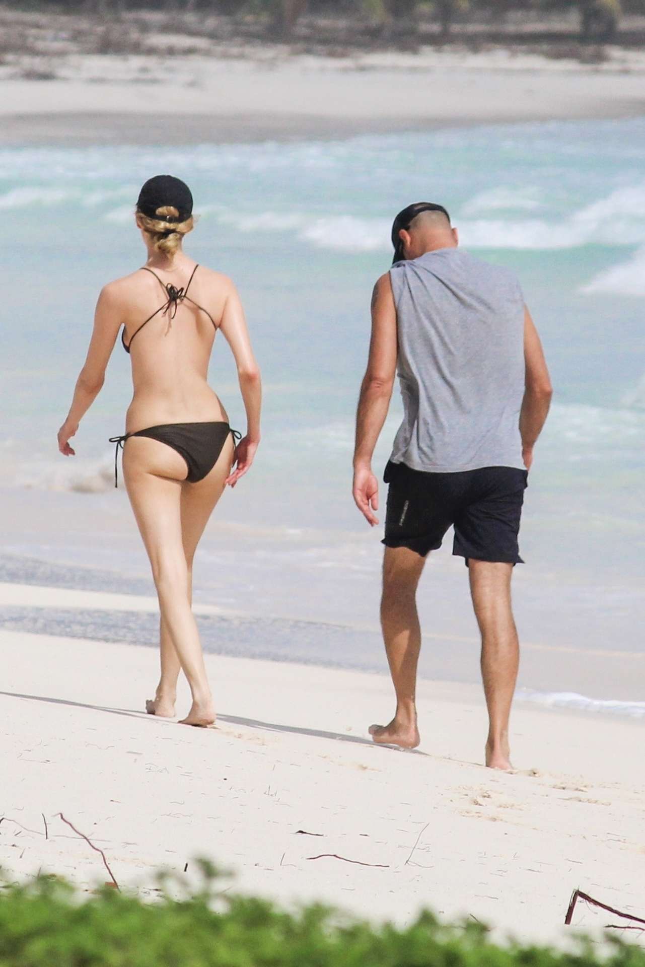 Martha Hunt in Bikini, Walking on the Beach with her Fiancé in Tulum, Mexico