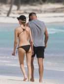 Martha Hunt in Bikini, Walking on the Beach with her Fiancé in Tulum, Mexico