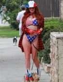 Phoebe Price Booty, with her Dog and Posing in a Patriotic Outfit
