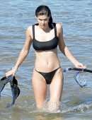 Alexandra Daddario Pokies in a Black Bikini on the Beach in Maui