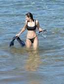 Alexandra Daddario Pokies in a Black Bikini on the Beach in Maui