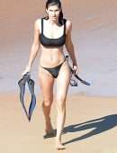 Alexandra Daddario Pokies in a Black Bikini on the Beach in Maui