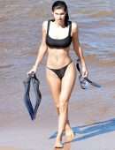 Alexandra Daddario Pokies in a Black Bikini on the Beach in Maui
