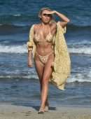 Amber Turner Cleavage in Bikini on the Beach in Dubai