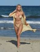 Amber Turner Cleavage in Bikini on the Beach in Dubai