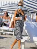 Charlotte McKinney in Black String Bikini as she Hits the Beach in Miami