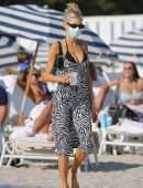 Charlotte McKinney in Black String Bikini as she Hits the Beach in Miami