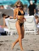 Charlotte McKinney in Black String Bikini as she Hits the Beach in Miami