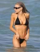 Charlotte McKinney in Black String Bikini as she Hits the Beach in Miami