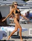 Charlotte McKinney in Black String Bikini as she Hits the Beach in Miami