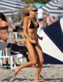 Charlotte McKinney in Black String Bikini as she Hits the Beach in Miami