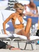Charlotte McKinney Cleavage on the Beach in Miami