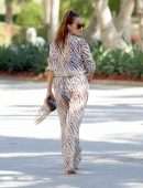 Chloe Goodman in a Zebra Print Jumpsuit out on Holiday in Dubai
