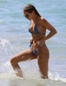 Kimberley Garner Cleavage in a Tiny Blue Bikini at the Beach in Barbados
