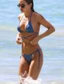 Kimberley Garner Cleavage in a Tiny Blue Bikini at the Beach in Barbados
