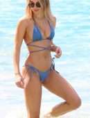 Kimberley Garner Cleavage in a Tiny Blue Bikini at the Beach in Barbados