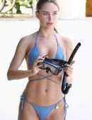 Kimberley Garner Cleavage in a Tiny Blue Bikini at the Beach in Barbados