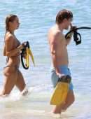 Kimberley Garner Cleavage in a Tiny Blue Bikini at the Beach in Barbados