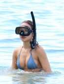 Kimberley Garner Cleavage in a Tiny Blue Bikini at the Beach in Barbados