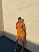 Kylie Jenner in a Yellow Tight Dress