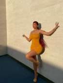 Kylie Jenner in a Yellow Tight Dress