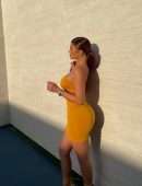 Kylie Jenner in a Yellow Tight Dress